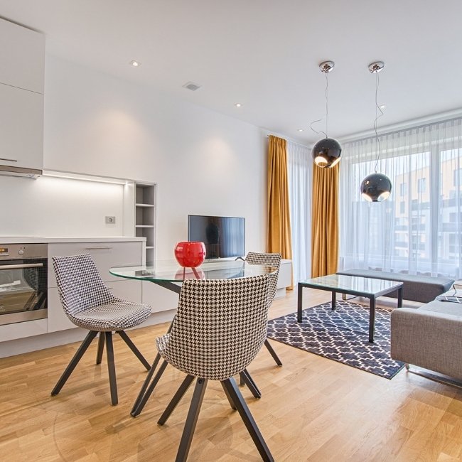 Image depicts a Vancouver condo with new hardwood floors.