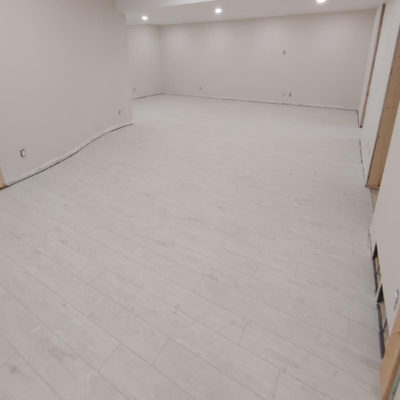Image depicts new floors from a click vinyl flooring installation project in London, Ontario.