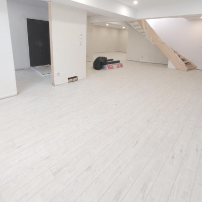 Image depicts new floors from a click vinyl flooring installation project in London, Ontario.