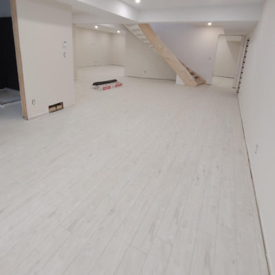 Image depicts new floors from a click vinyl flooring installation project in London, Ontario.