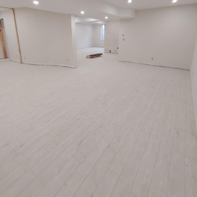 Image depicts new floors from a click vinyl flooring installation project in London, Ontario.