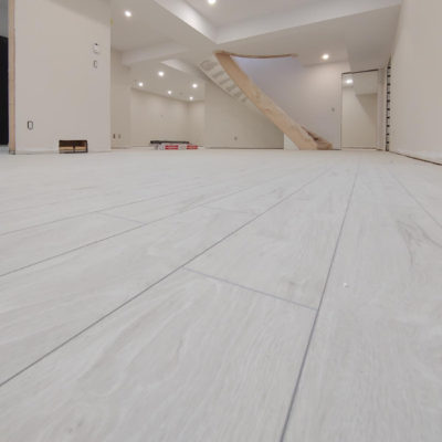 Image depicts new floors from a click vinyl flooring installation project in London, Ontario.
