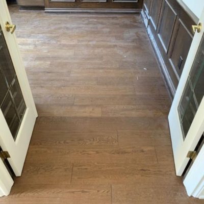 Image depicts newly installed wood floors from a engineered hardwood flooring installation project in London, Ontario.