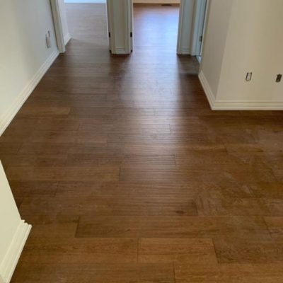Image depicts newly installed wood floors from a engineered hardwood flooring installation project in London, Ontario.