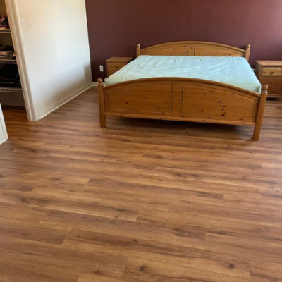 Image depicts new floors from a laminate flooring installation project in Mississauga, Ontario.