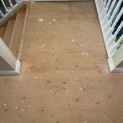 Image depicts old floors from a solid hardwood flooring installation project in London, Ontario.