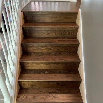 Image depicts new floors from a solid hardwood flooring installation project in London, Ontario.