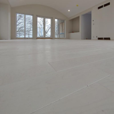 Image depicts new floors from a solid hardwood flooring installation project in Sarnia, Ontario.