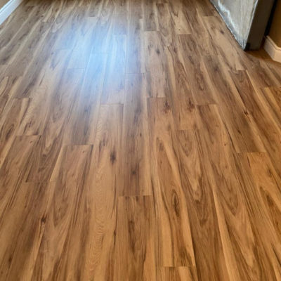 Image depicts new floors from a vinyl flooring installation project in Milton, Ontario.