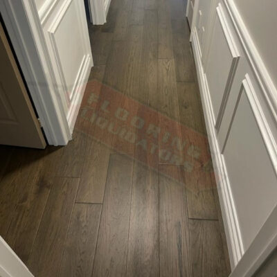 dark engineered floors installed in home
