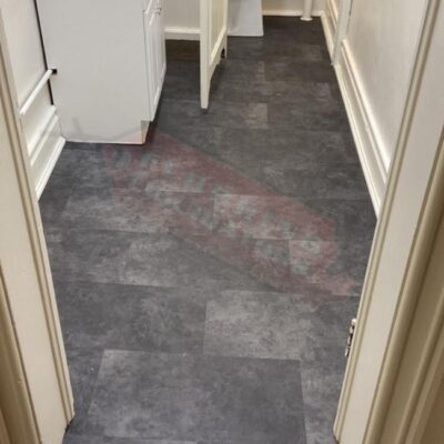 installing glue down vinyl floor in church